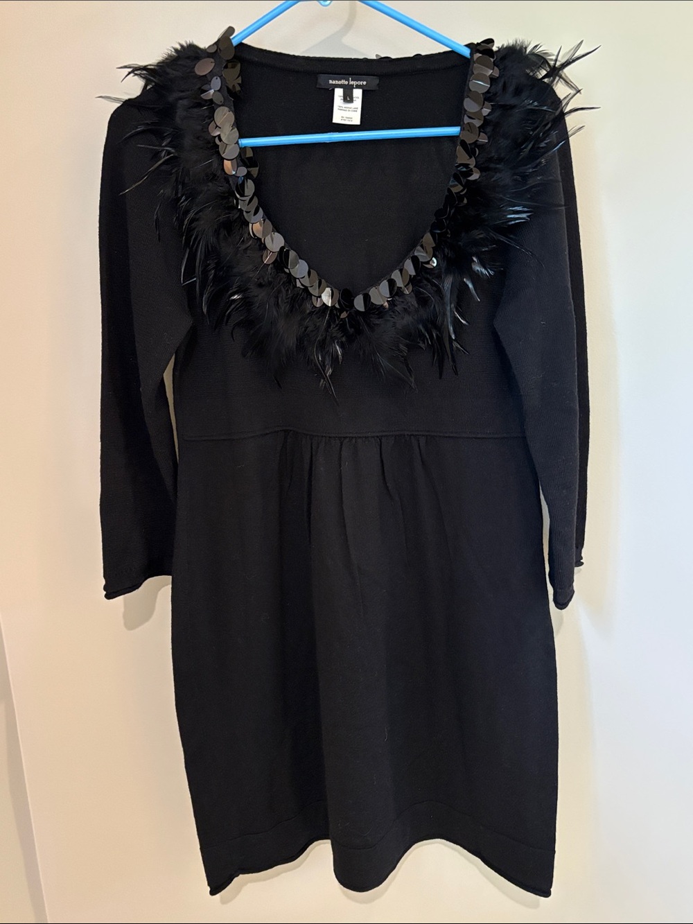 Nanette Lepore black sweater dress w feather and sequin trim at neckline; size L